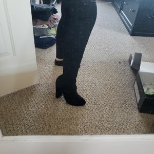 Black thigh high boots